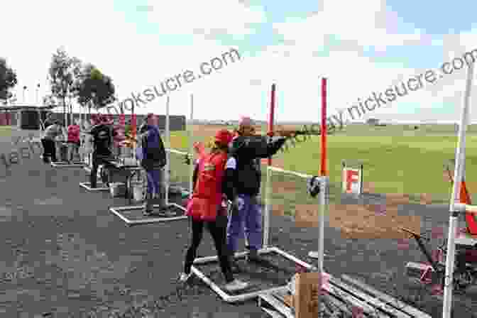 Clay Target Shooter Receiving Support From A Coach. Mind Vs Target: Six Steps To Winning In The Clay Target Mind Field