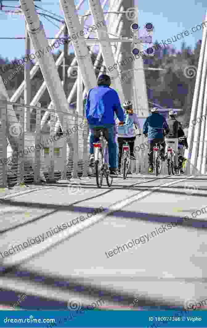 Cyclists Crossing The Freedom Bridge In Austria, A Poignant Symbol Of Europe's Reunification. The Cyclist Who Went Out In The Cold: Adventures Riding The Iron Curtain